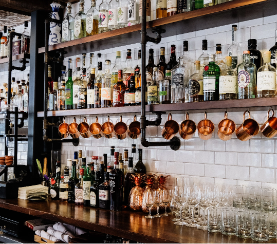 Background Photo of Liquor Behind Bar - Photo by David Straight