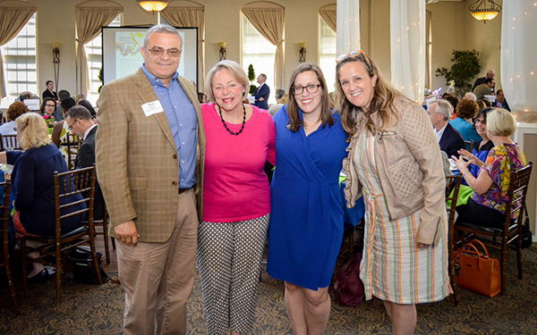 Council members posing for a group photo at an awards lunch