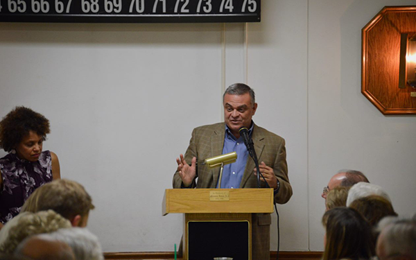 Councilman David Yungmann speaking at a dinner event for the Farm Bureau