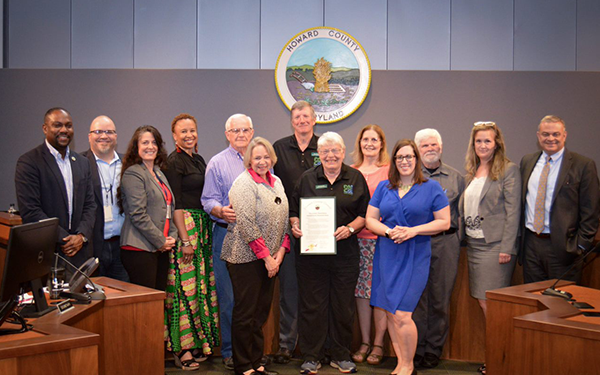 Council members in a group photo commemorating Historic Preservation Month