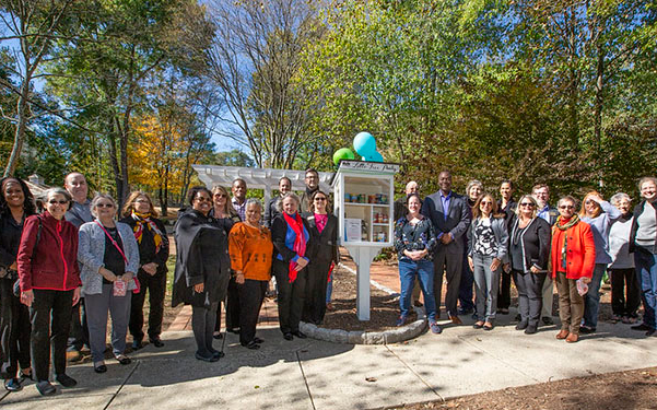 A photo of council member Deb Jung at the launch of the Little Free Pantry program